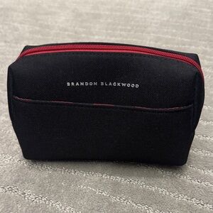 Never used and sealed Brandon Blackwood Men's Black Toiletry Bag with Red